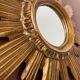 Vintage sun mirror in 60s/70s gold resin