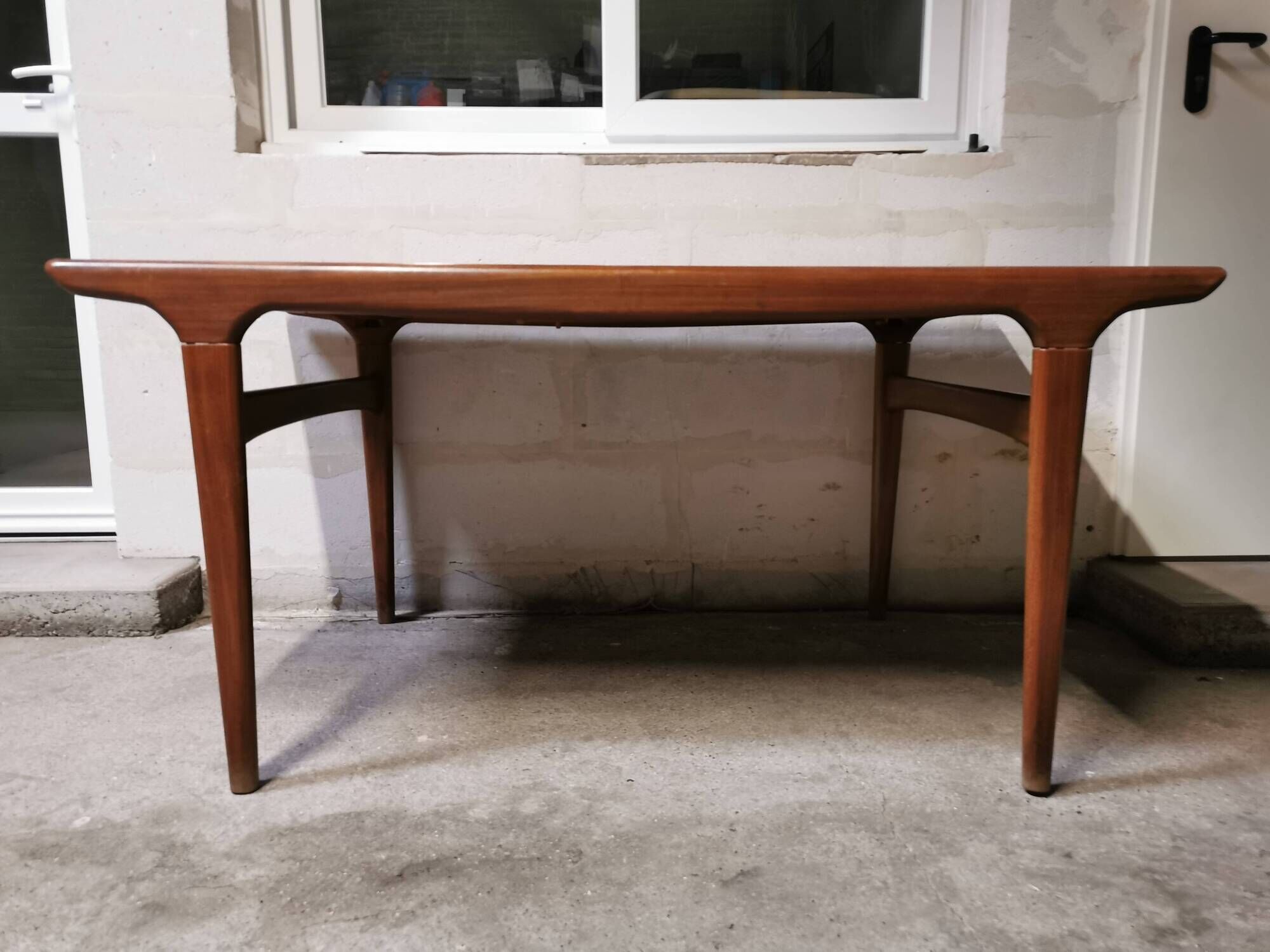 Vintage Scandinavian design table in Teak asymmetric extension by Johannes Andersen 1960