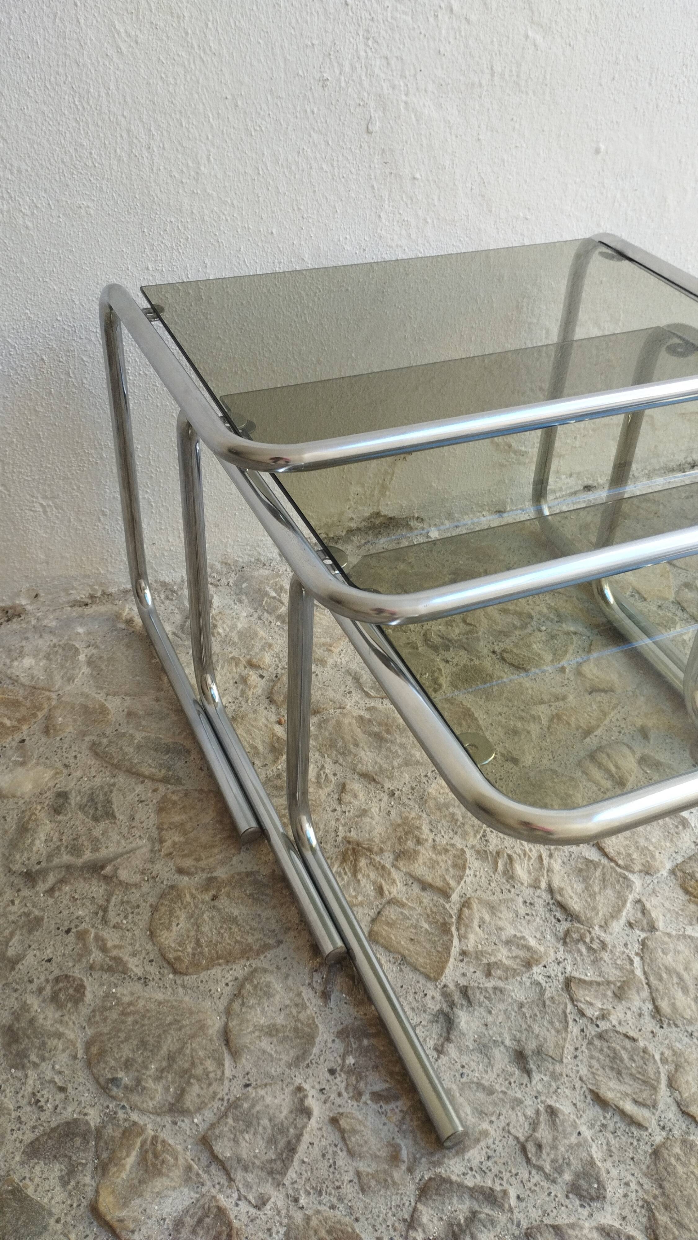Nesting tables in chrome and smoked glass from the 70s