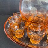 Liquor service in pink moulded glass