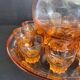 Liquor service in pink moulded glass