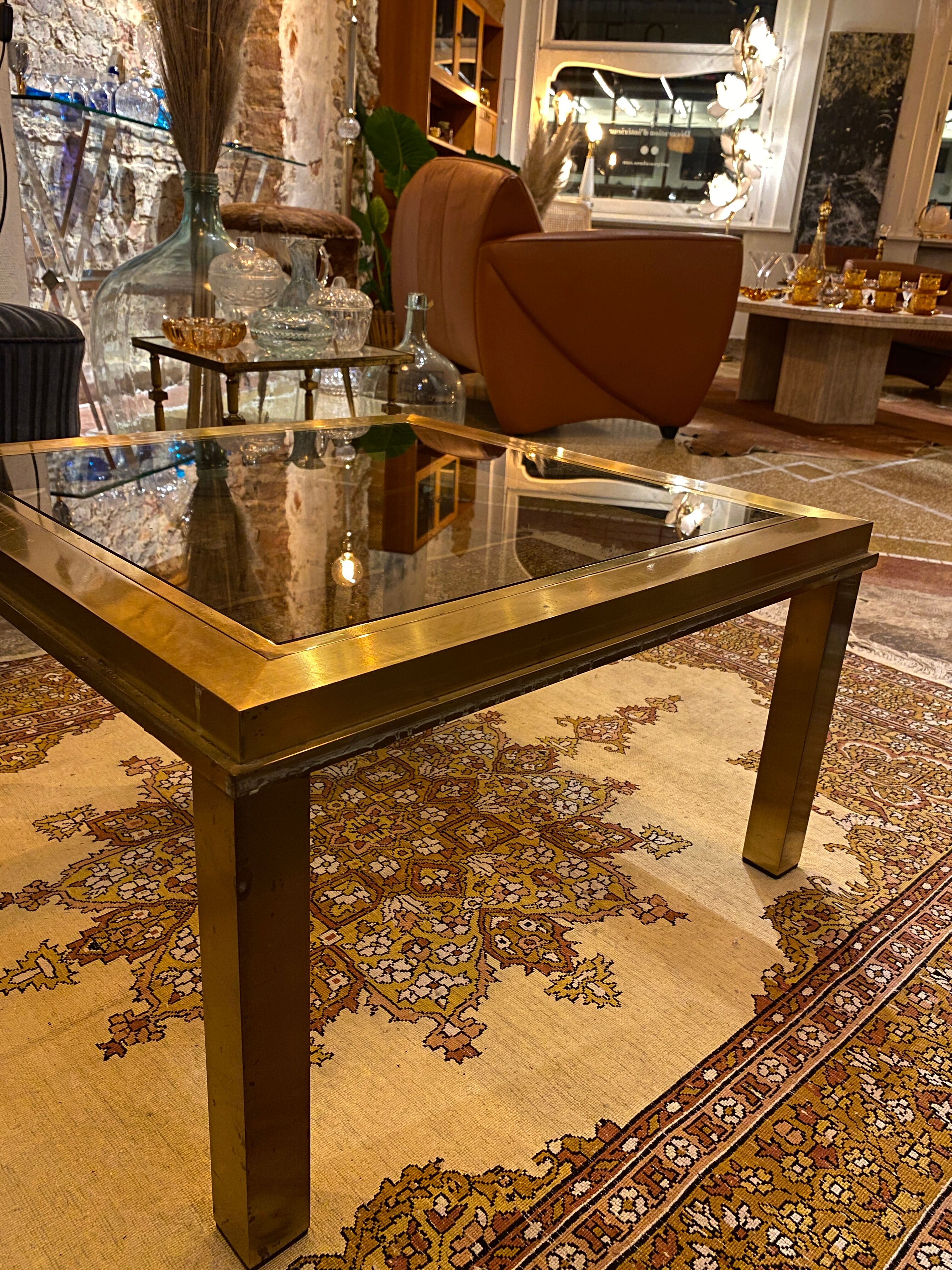 Gold square coffee table and smoked glass