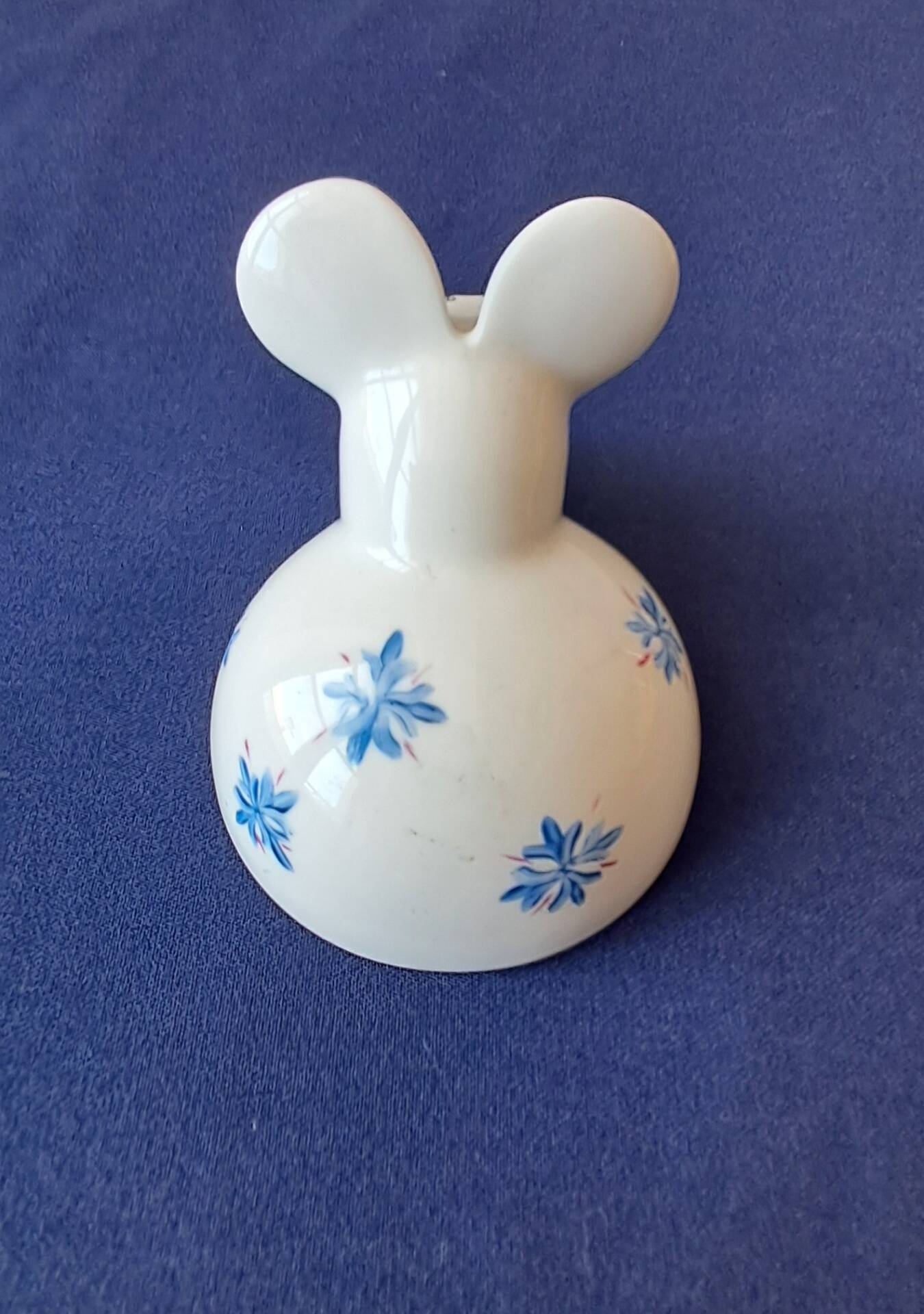Salt cellar or porcelain salt shaker. Zoomorphic figurine of a mouse.