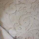 Old sheet with monograms and wide hand made embroider.