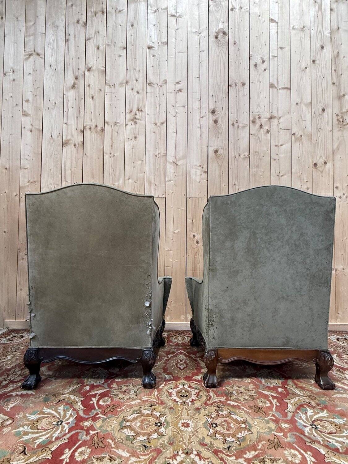 Pair of wingback armchairs in George III style – Carved wood – 18th century.