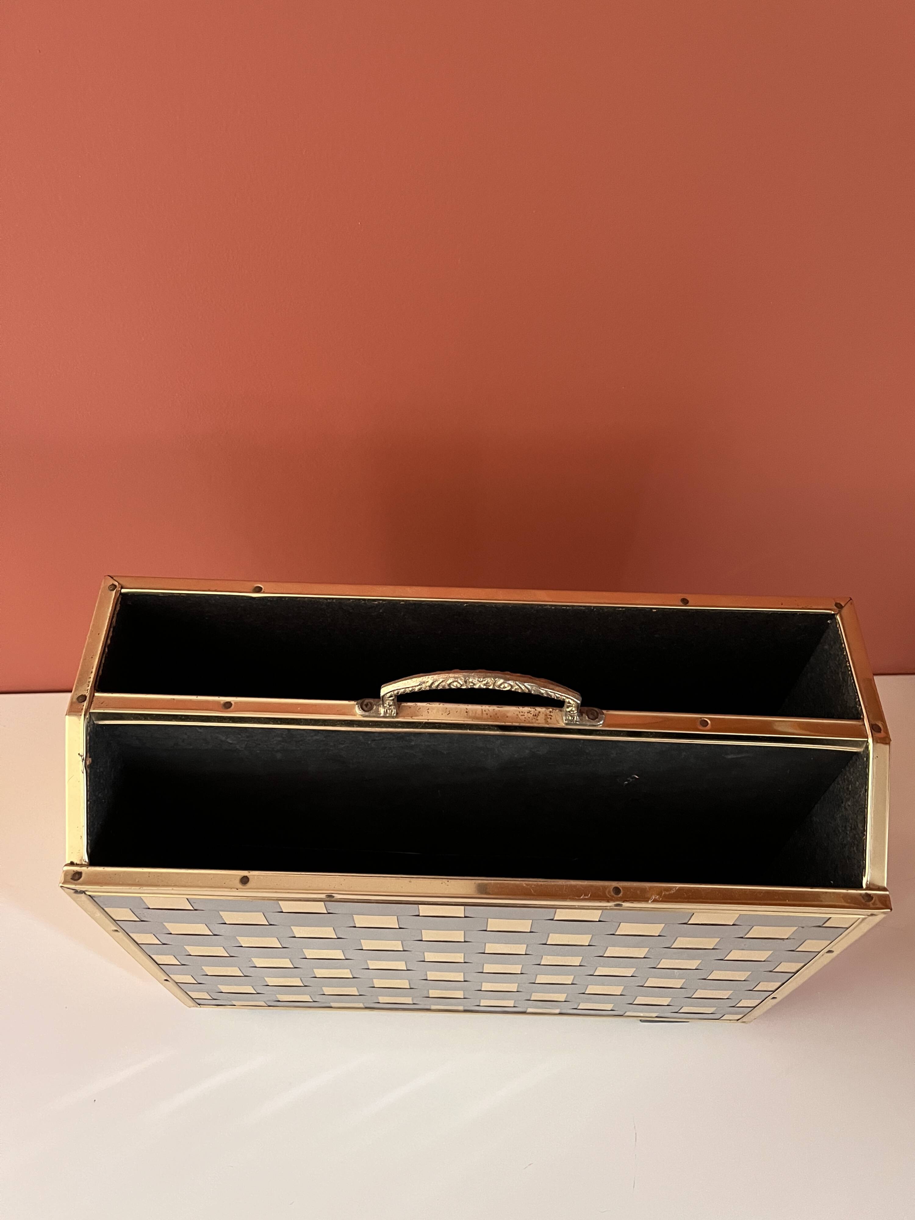 Brass and wood magazine rack in Hollywood Regency style.