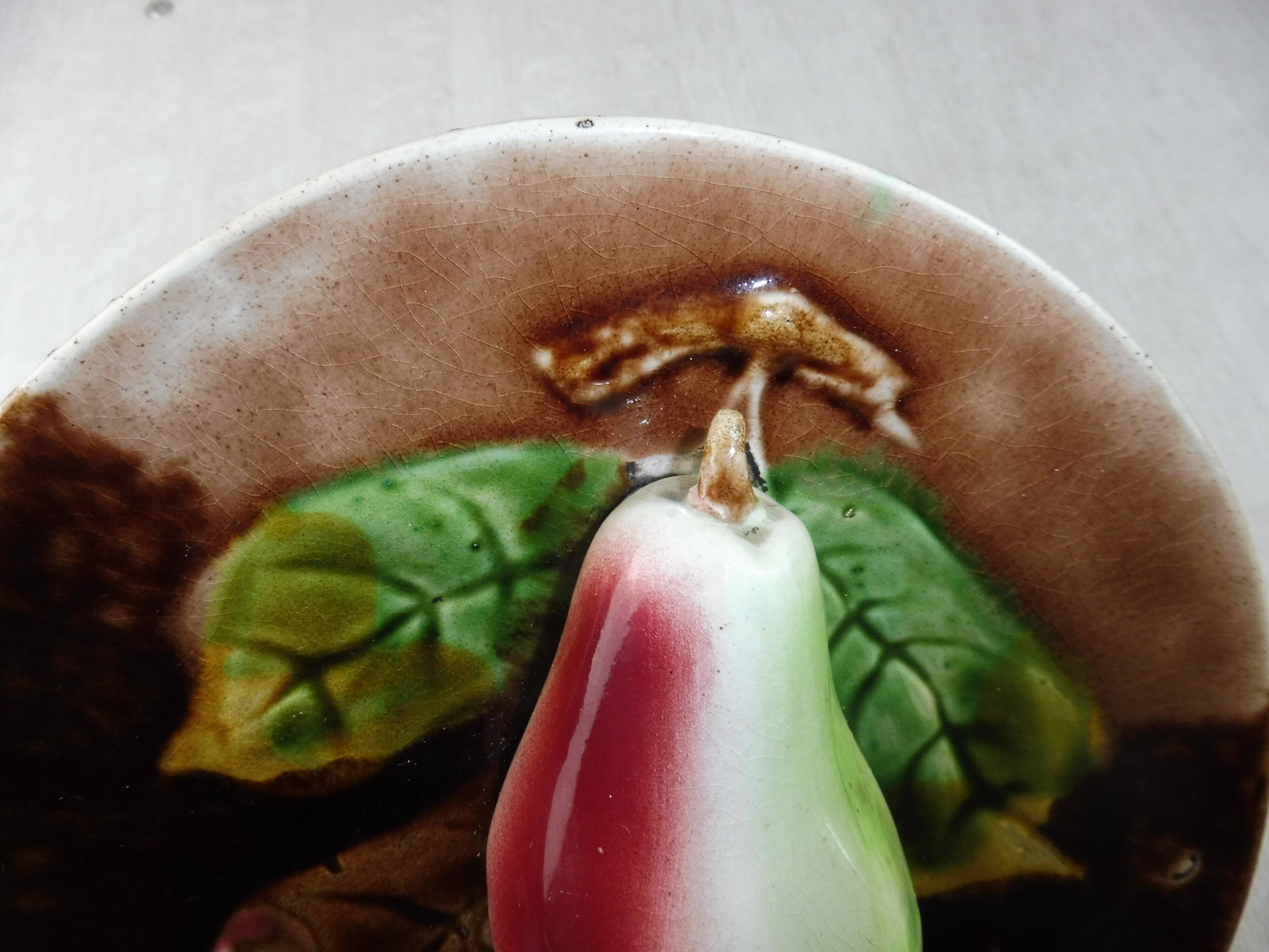 Old plate in dabbling, pear in relief