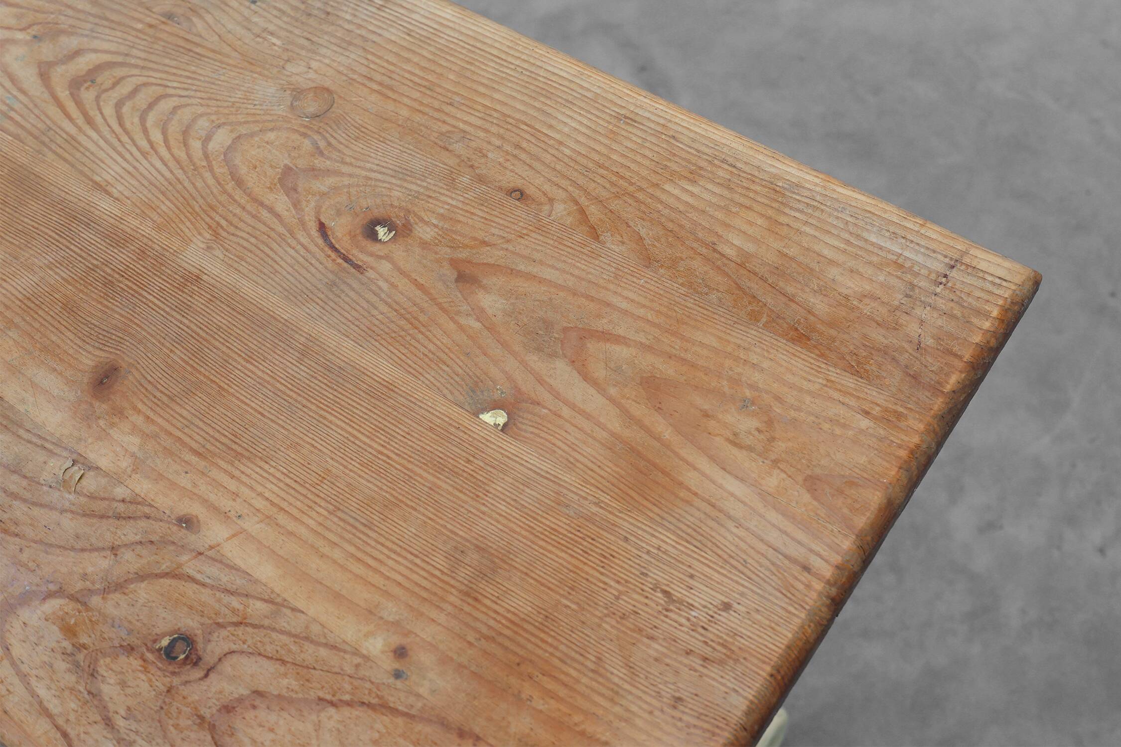 20th century French bistro table with cast iron base and oak top