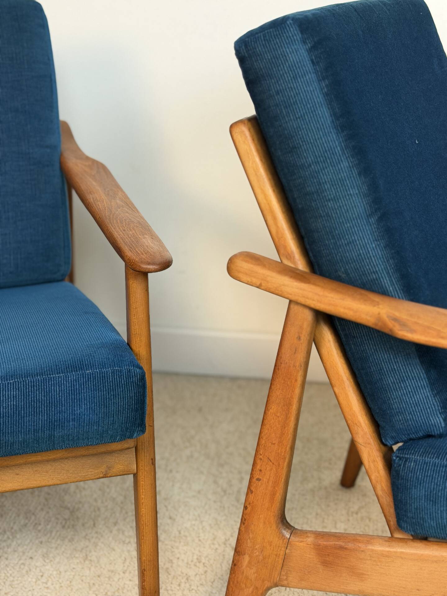 a pair of Scandinavian armchairs in teak from the 1960s