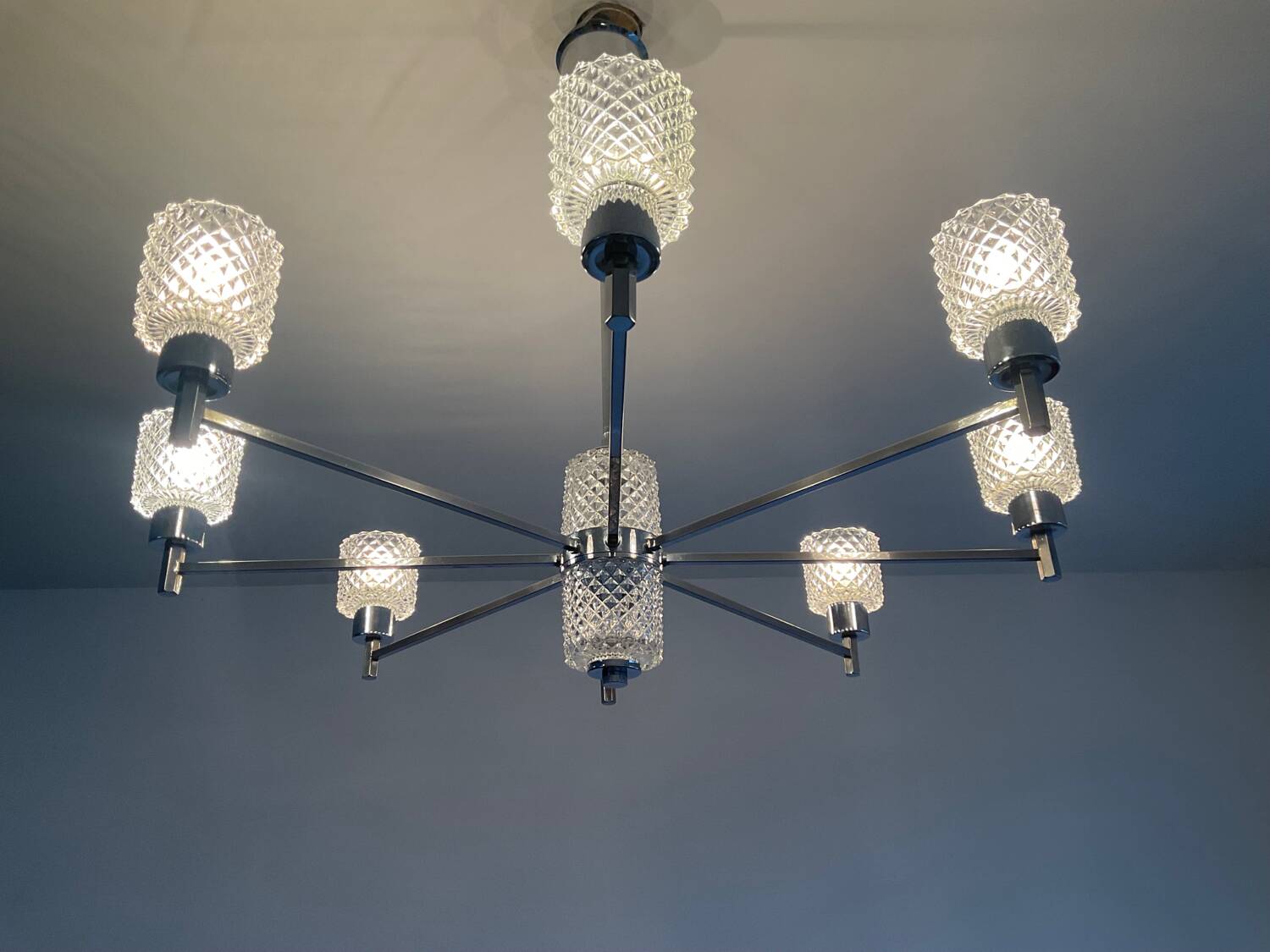 Vintage Italian chandelier from the 60s in chromed metal and glass