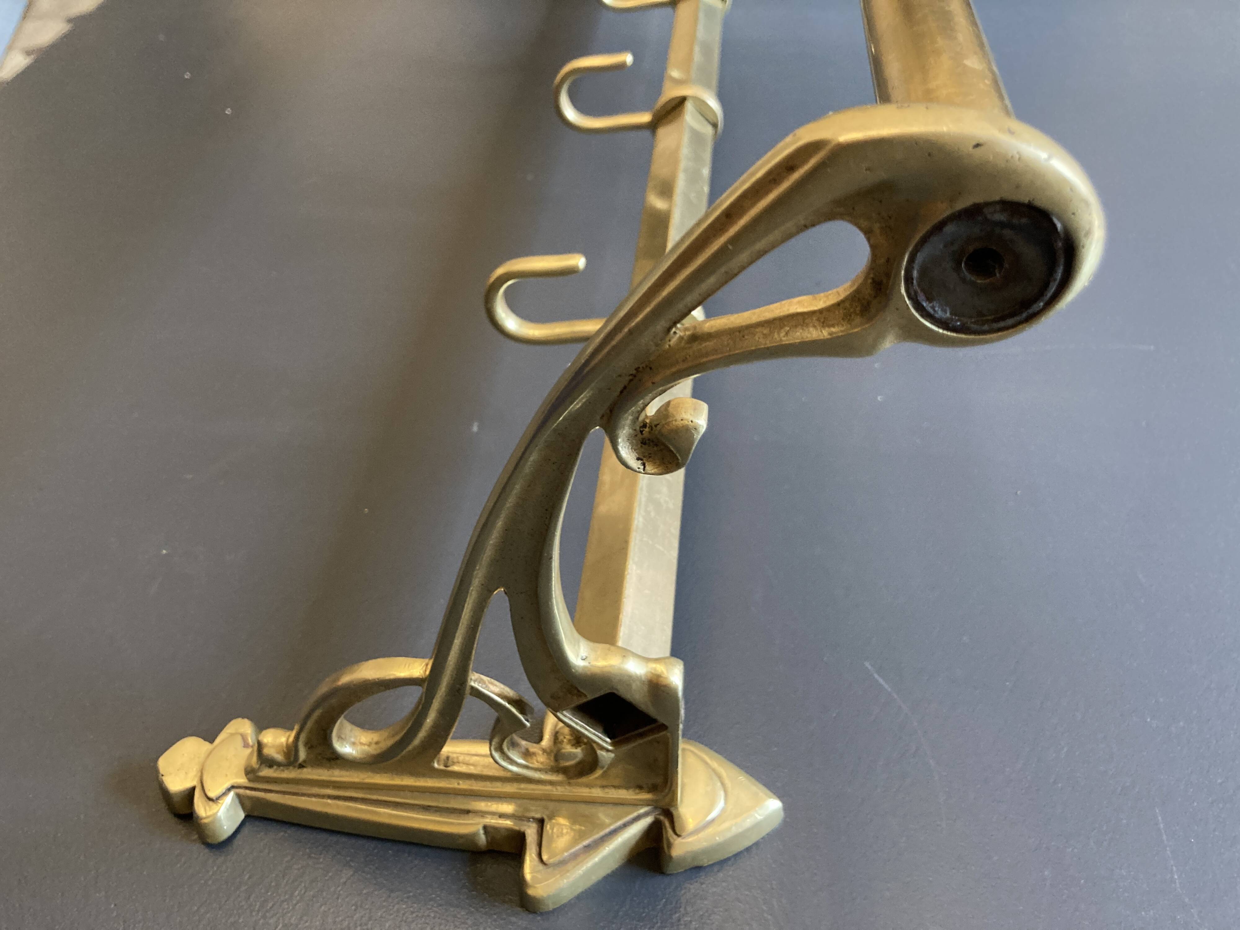 Art-deco wall-mounted coat rack in brass