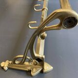 Art-deco wall-mounted coat rack in brass