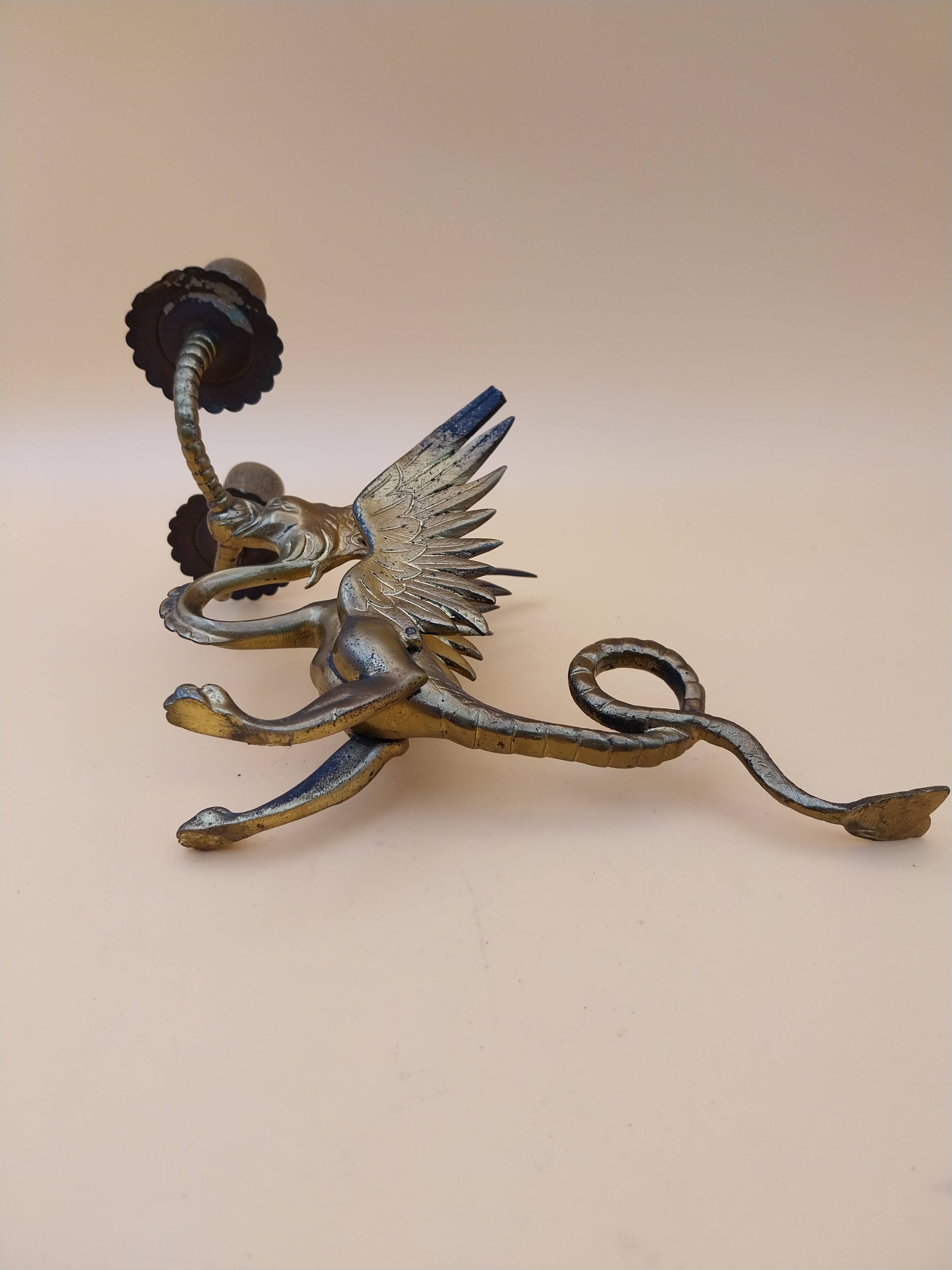 Pair of bronze candlesticks with chimera dragons