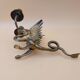 Pair of bronze candlesticks with chimera dragons