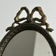 Petit miroir oval ancien