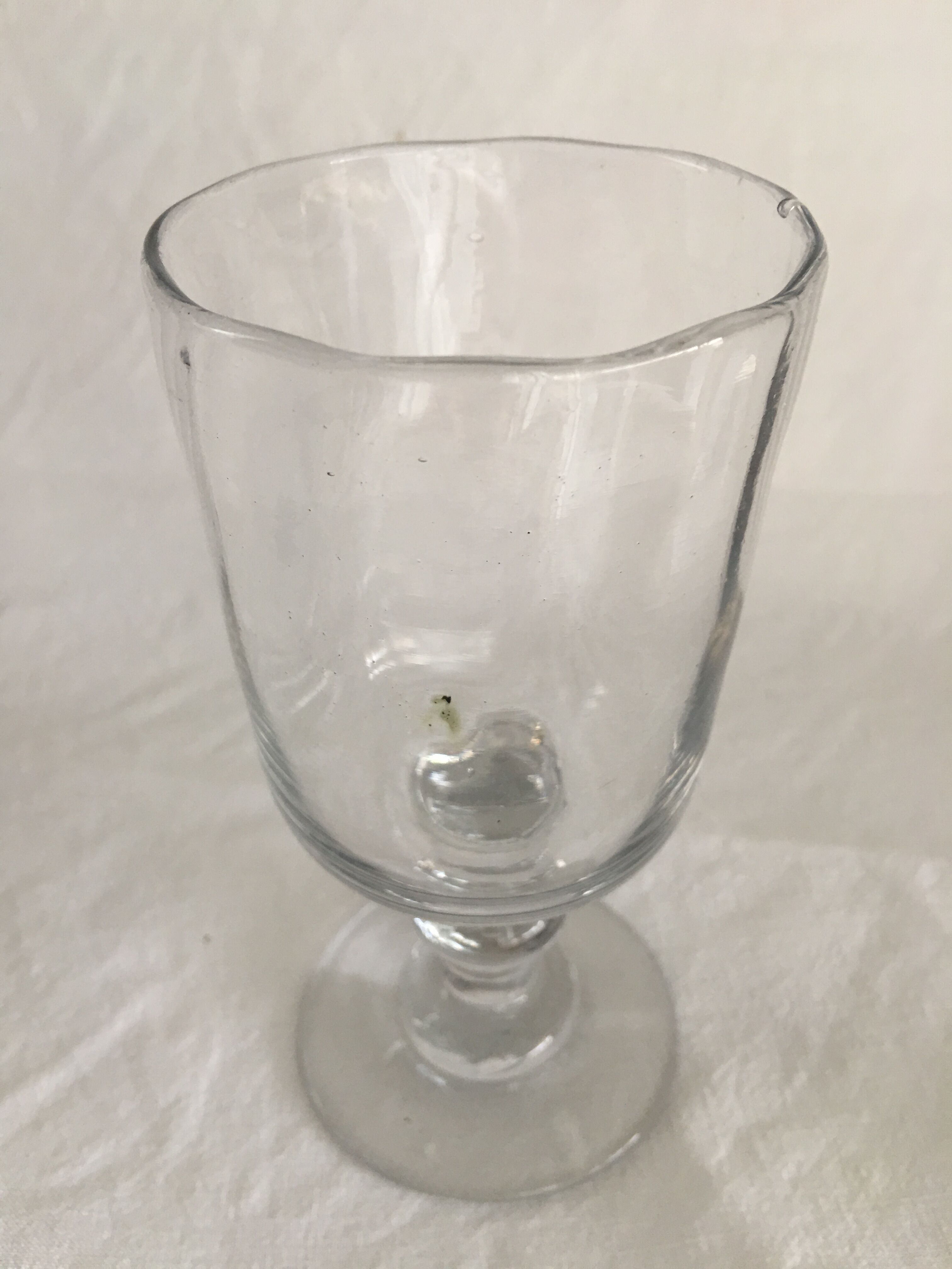 Glass on foot - blown glass bubble late nineteenth early twentieth