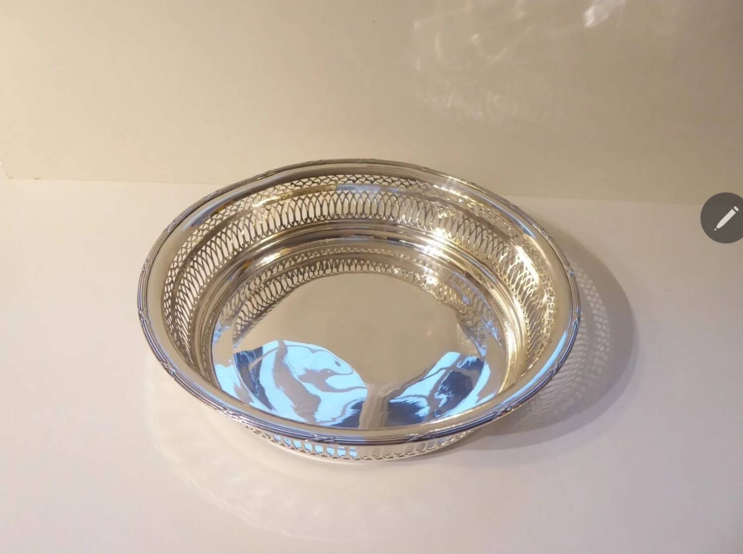 Large openwork basket in silver metal