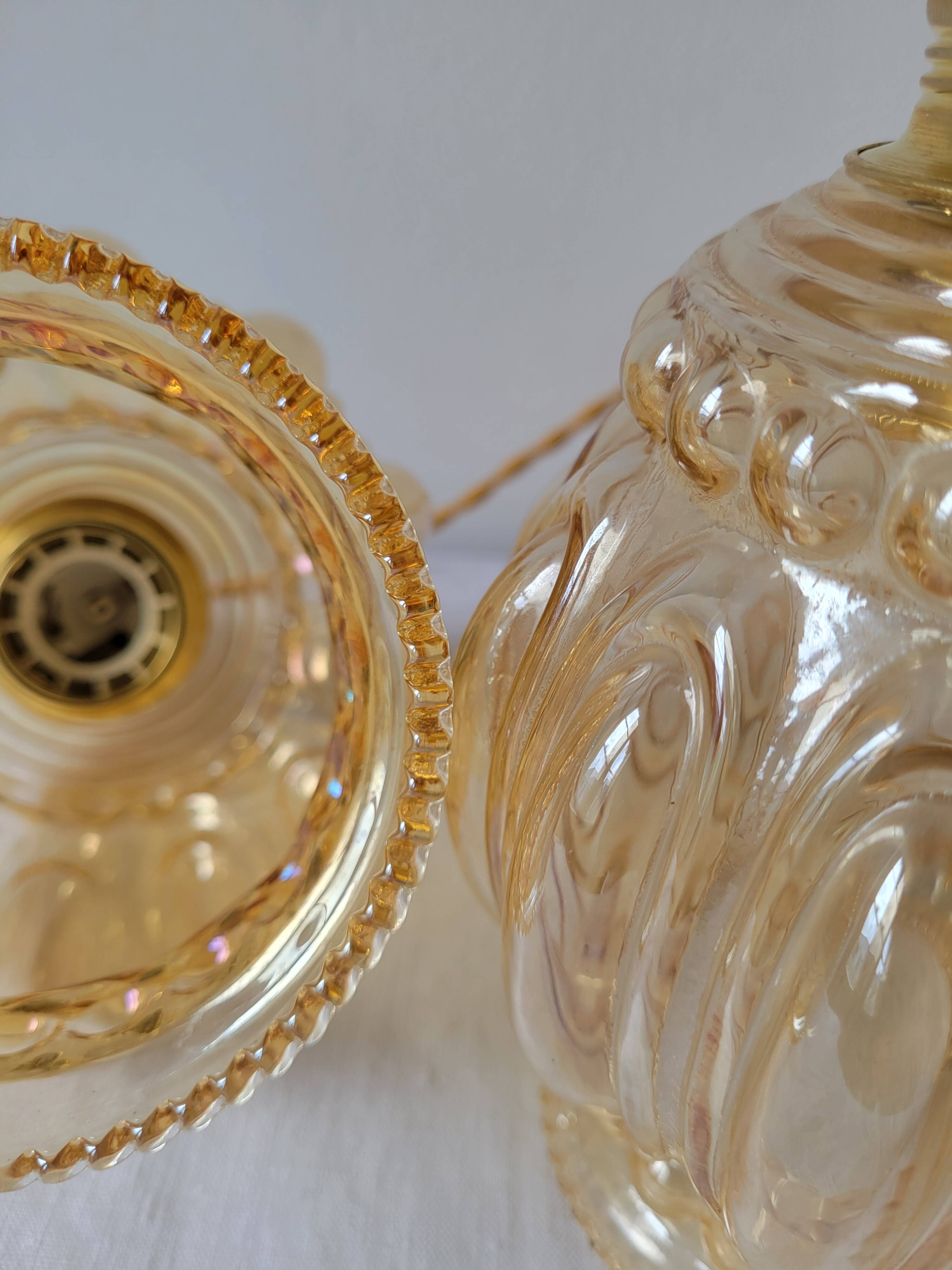 Duo of amber molded glass pendant lights