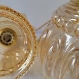 Duo of amber molded glass pendant lights