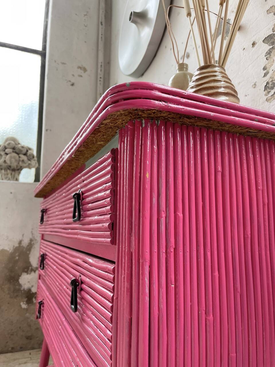 Vintage pink rattan chest of drawers