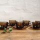 Six smoked glass coffee cups