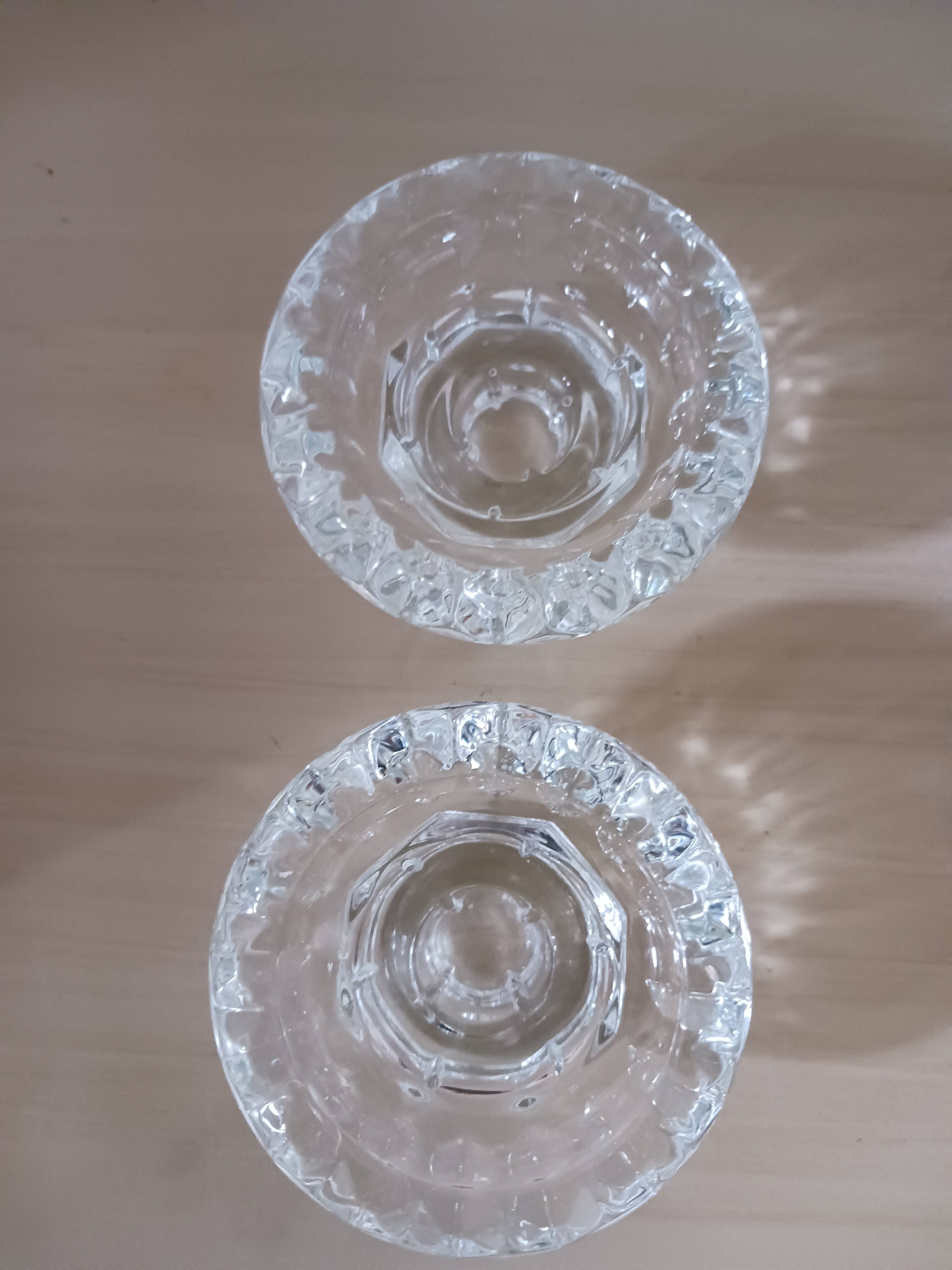 Moulded glass candle holders.