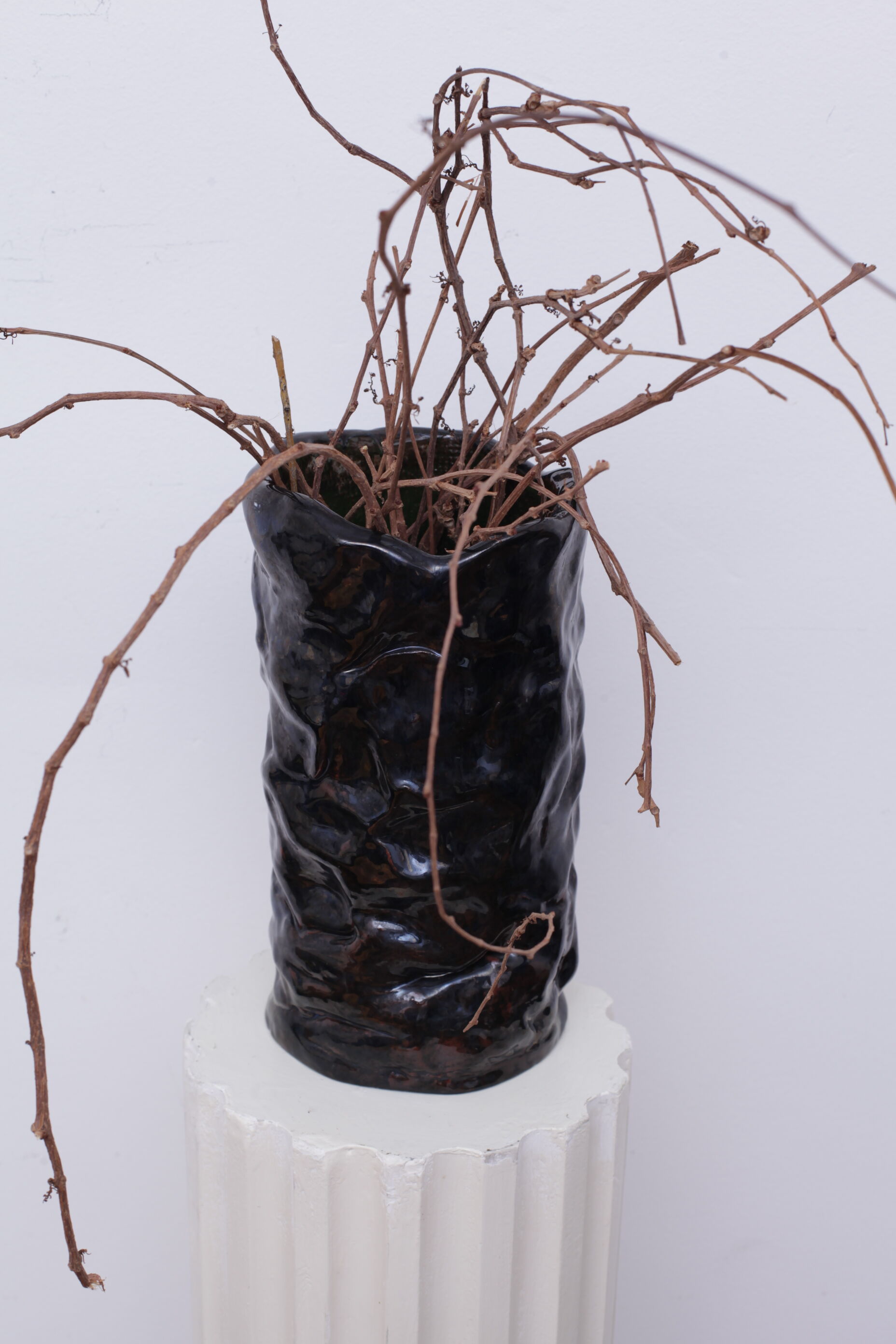 Thick black ceramic vase