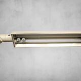 Beige plastic table lamp Lucifer, mid-century modern Scandinavian style.