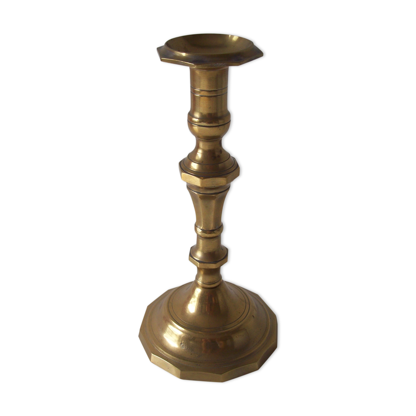 Former Golden brass candlestick