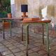 Pair of 1960s tables in tubular metal and solid teak