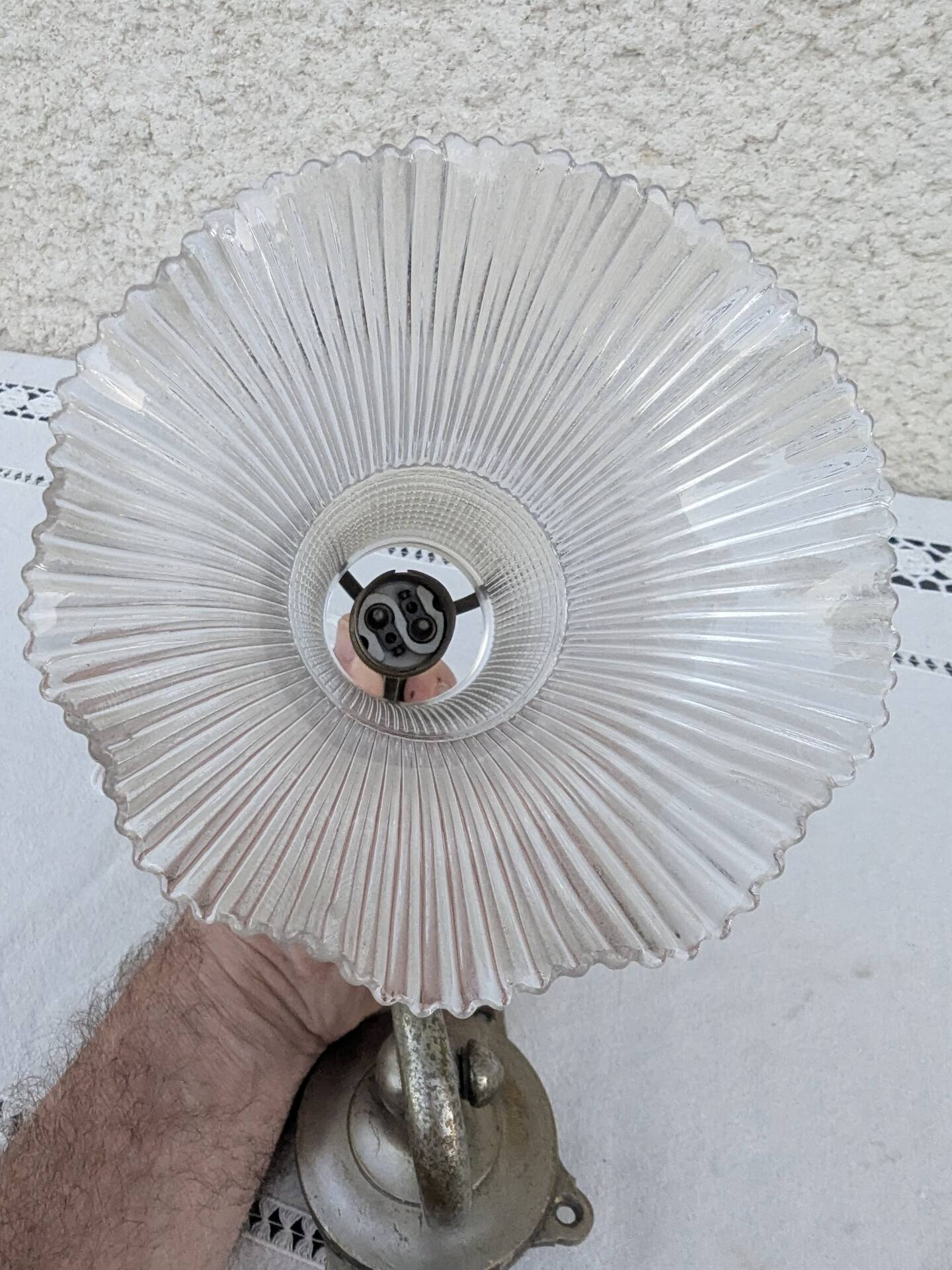 Vintage wall sconce in brass with Holophane glass tulip.