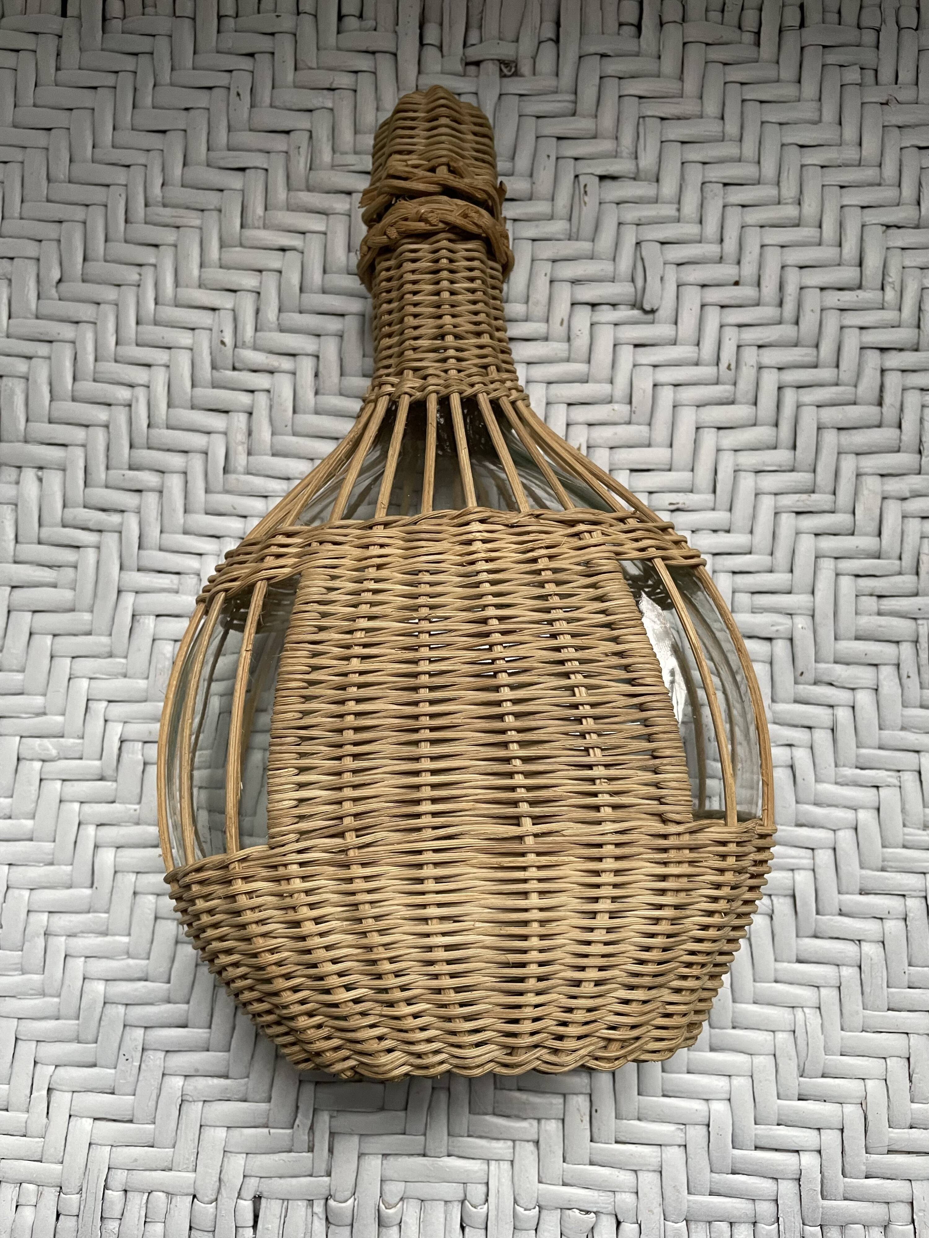 Wicker-sheathed glass bottle