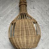 Wicker-sheathed glass bottle