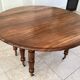 Table ronde ancienne en noyer
