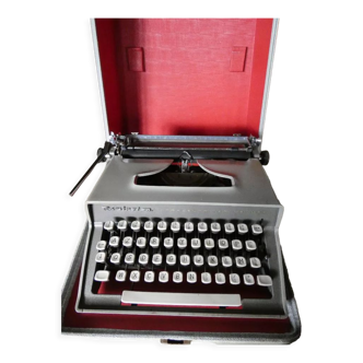 Machine à écrire de marque remington modèle travel riter deluxe