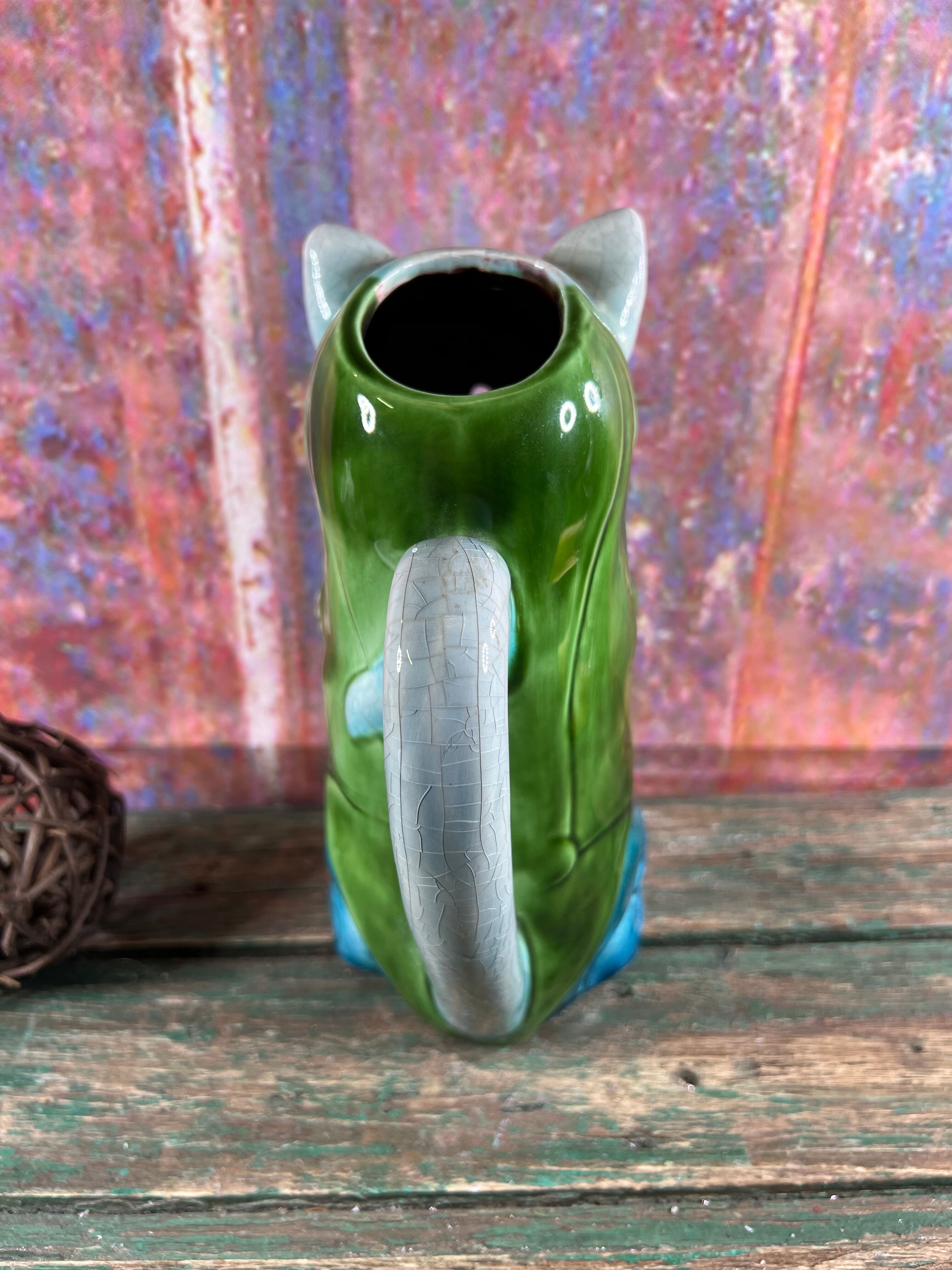 Pitcher slurry cat musician