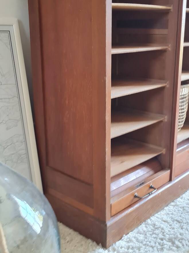 Vintage double curtain filing cabinet.