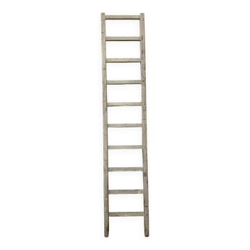 Large decorative ladder or towel rack.