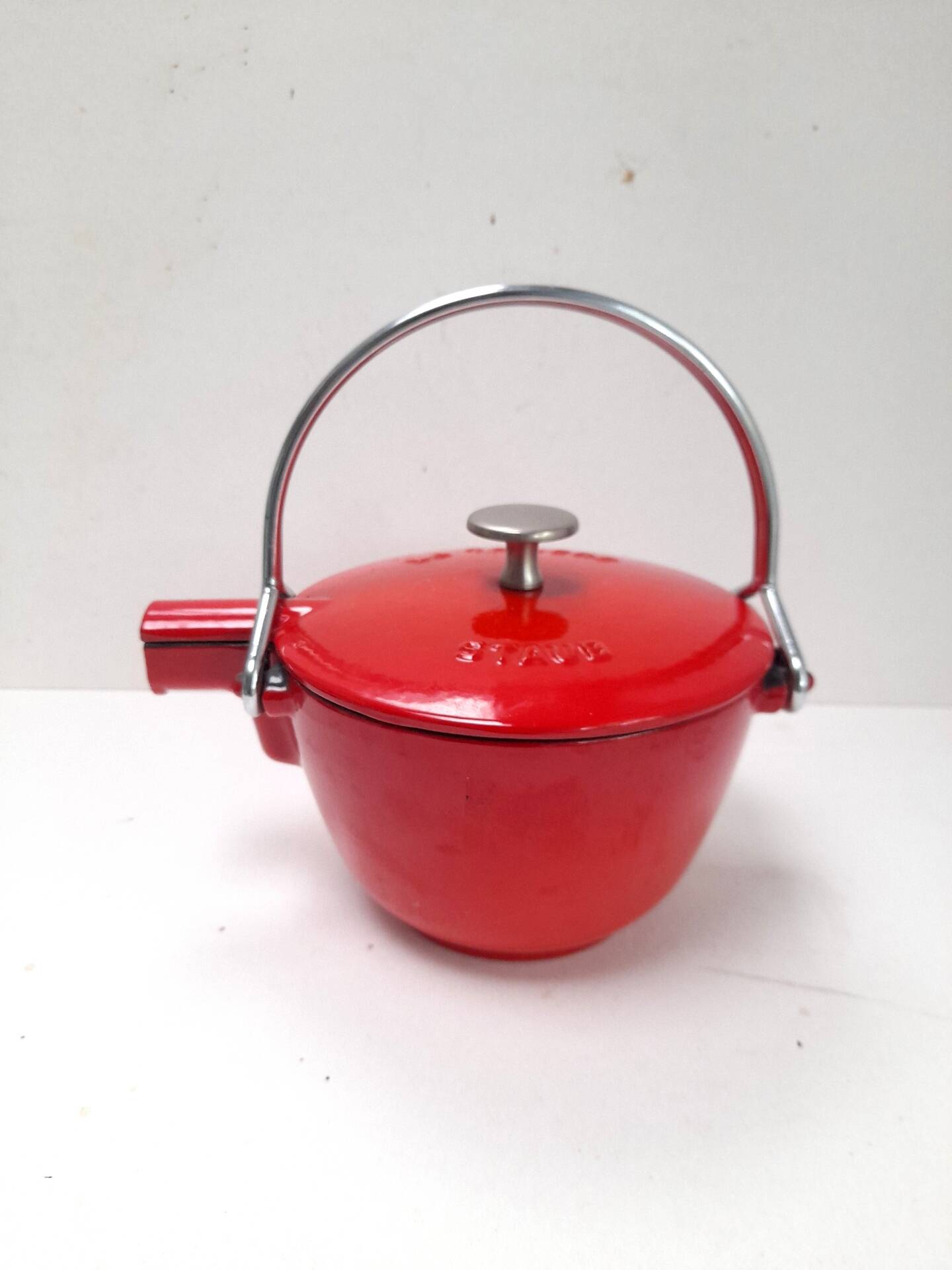 The Staub red enamelled cast iron teapot.