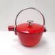 The Staub red enamelled cast iron teapot.