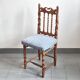 Chaise vintage en bois sculpté