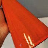 Ceramic table lamp with partial orange glaze.