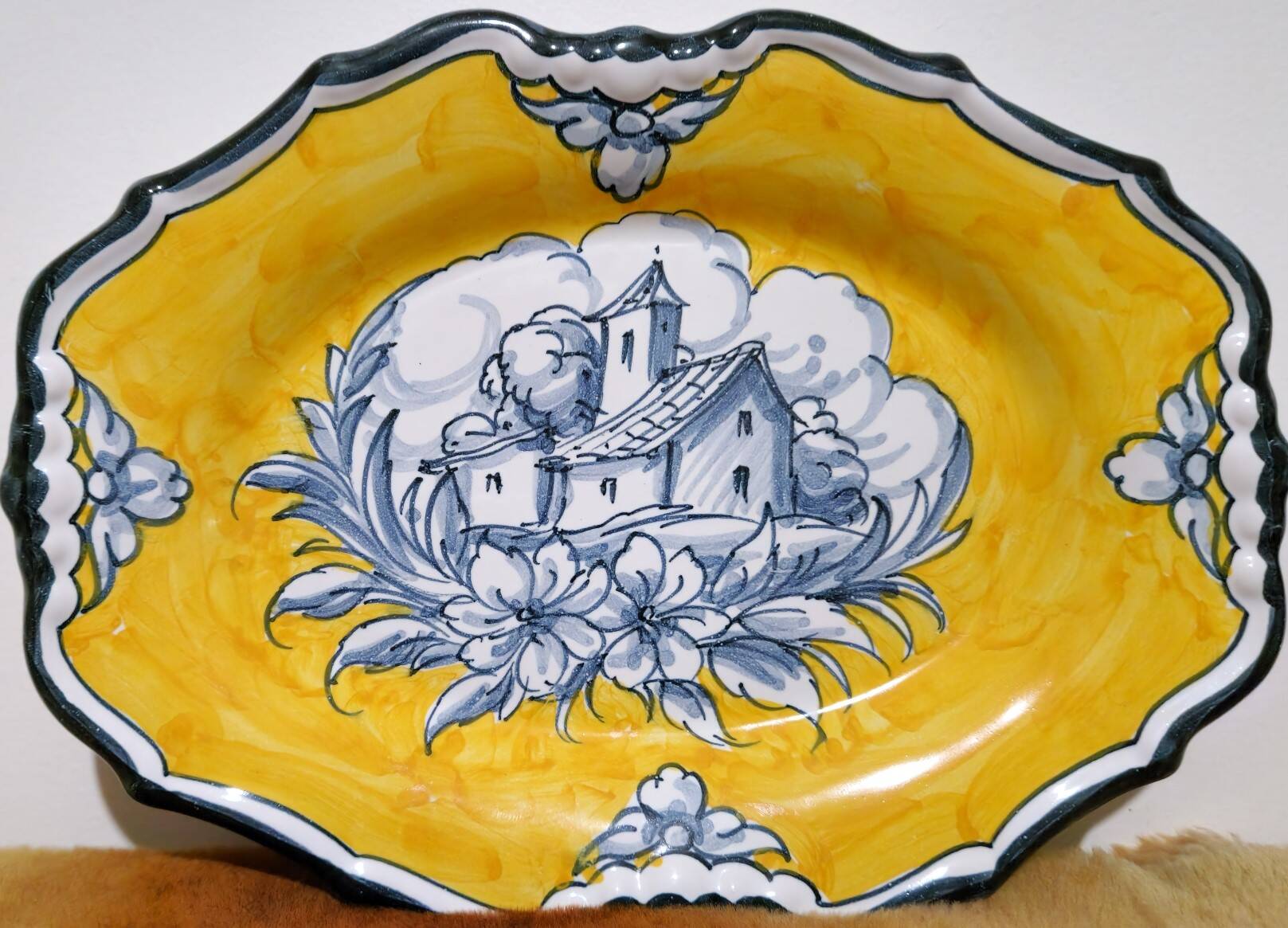 Pair of oval dishes in hand-painted faience with an Italian majolica spirit.