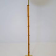 Mid-century floor lamp in brass and oak by Falkenbergs Belysning, Sweden, 1960s.