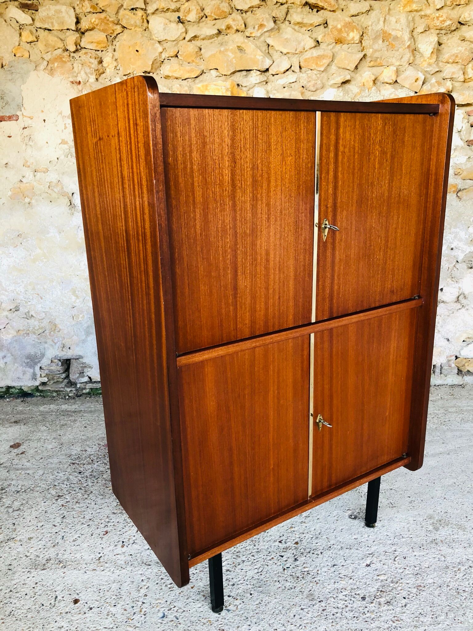 Storage cabinet with double compartment, metal feet circa 60's
