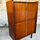 Storage cabinet with double compartment, metal feet circa 60's
