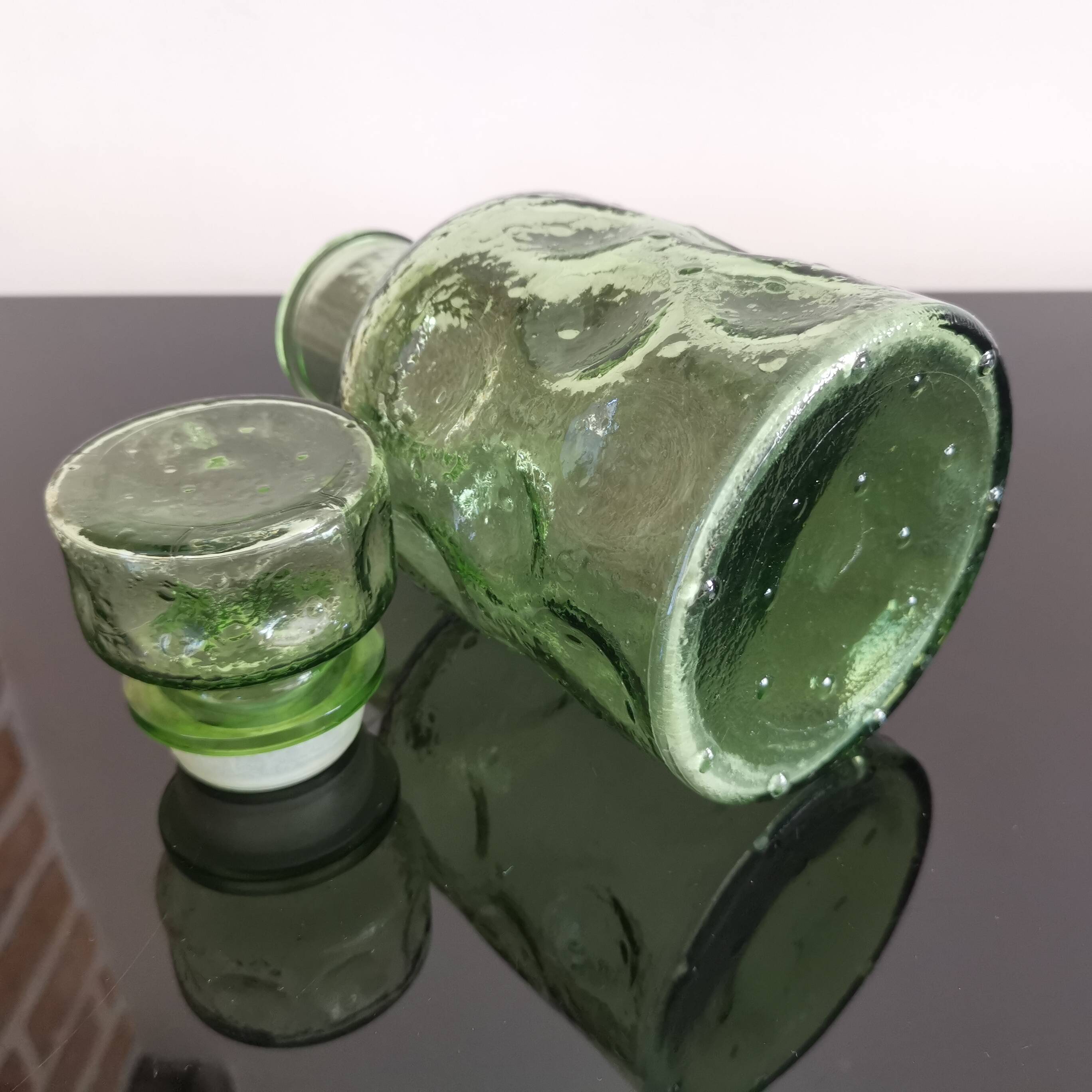 Old green glass carafe