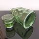 Old green glass carafe