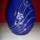 Blue lacquered vase with flowers & applied leaves