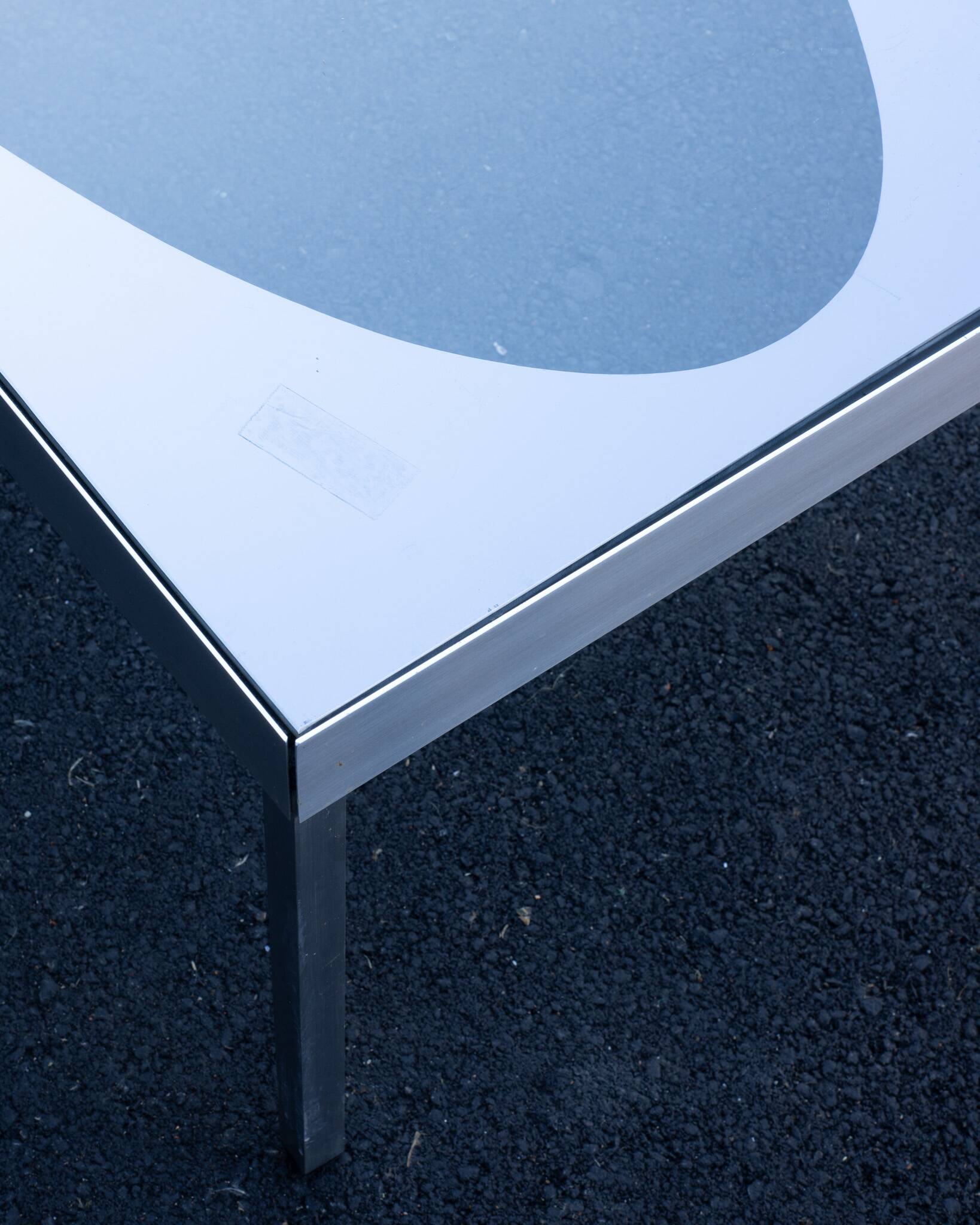 Glass coffee table with brushed aluminum legs, 1970
